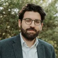 Headshot of A. Tunc Sen